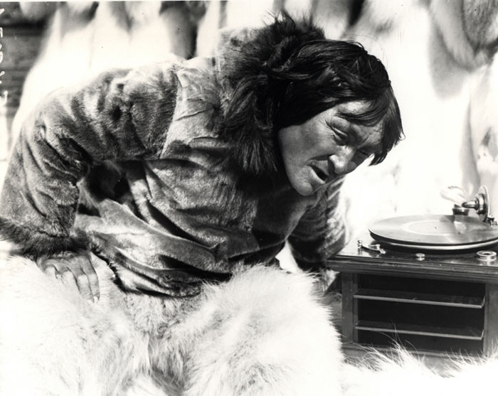 Nanook listens to a photograph for the first time. Image: jf sklfjsdj