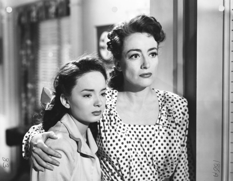 Blyth with on-screen mother, Joan Crawford. Image: laksdjf desk 