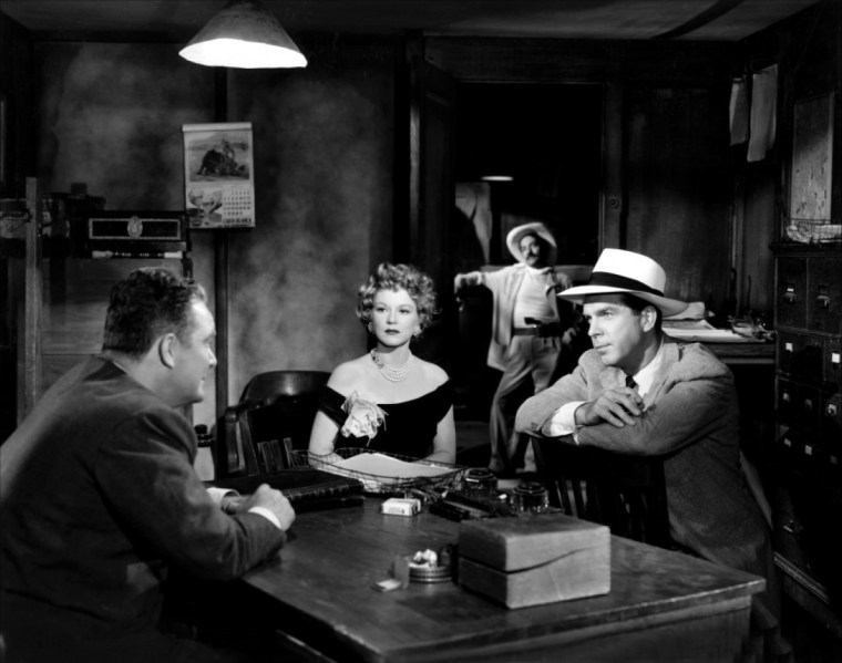 It's up to Claire Trevor (centre) to take down a Mexican drug ring. Image: Wikipedia