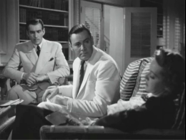 Davis calmly tells James Stephenson (left) to open the letter.