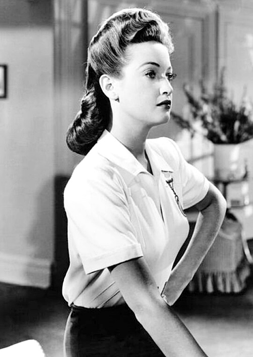 Lamour, in her Adrian wardrobe and take-charge demeanour. Image: