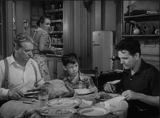 Wallace Ford (left) refuses to eat Garfield's turkey dinner; Image: RavePad