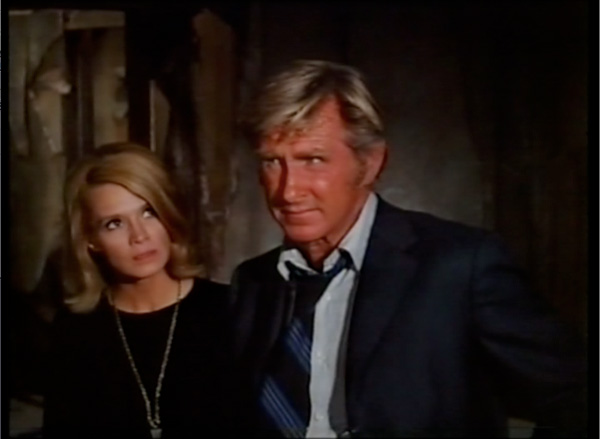 Angie Dickinson wants to know why Lloyd Bridges is so strange. Image: Modcinema